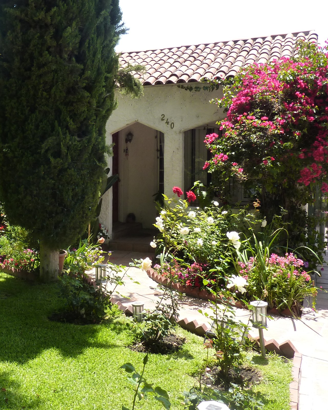 A 1930s Spanish Revival home on a sunny Burbank street; illustrative area photo, not a Yelena Mun listing
